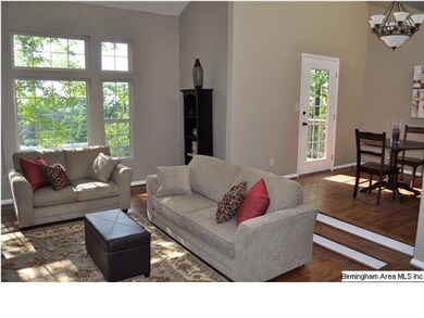 View of the living and dining area with new window