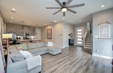 This photo showcases a modern, open-concept living