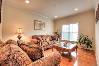 Living room with real hardwood floors & recessed l