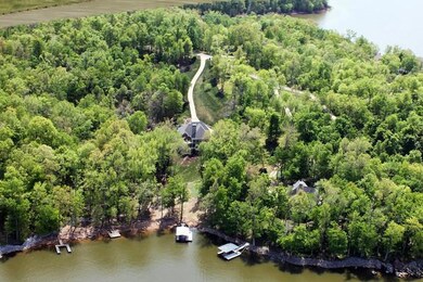 Rear view of house with Lake Barkley and private boat dock in foreground