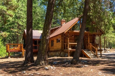 The home was expanded in 2002 and incorporates the original 1980s-era log cabin with stone foundation. Don't miss downstairs bonus room - perfect for wine cellar or cold storage.