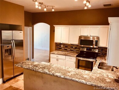 Kitchen with SS appliances