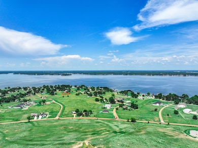 View of property location with a nearby body of water