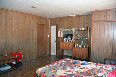 Family room.  Currentlly being used as 3rd bedroom