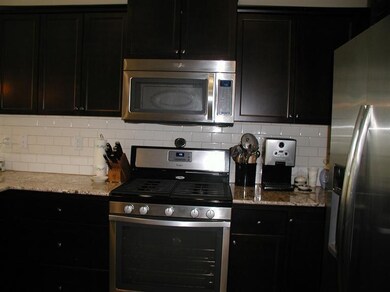 Black and Stainless Steel appliances. 5 Burner gas