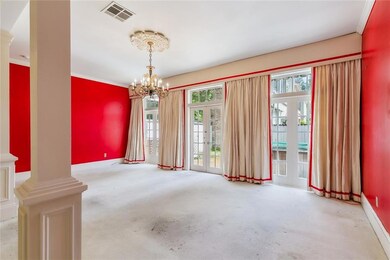 Living Room with Chandelier, Glass French Doors op