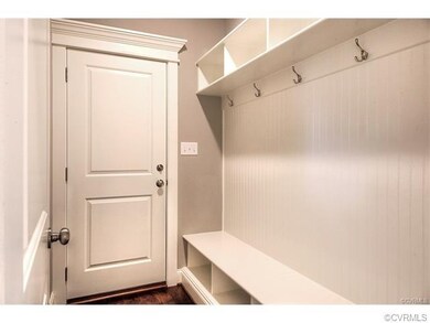 Drop zone coming in from garage.  Perfect place for coats, backpacks, and sports gear