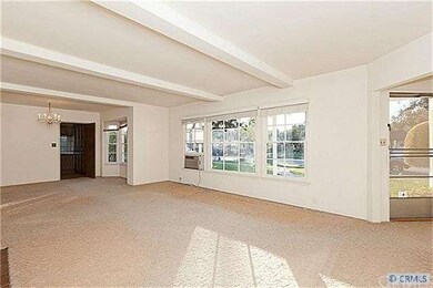 Large living room overlooks front yard