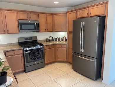 Kitchen that features stainless steel appliances,