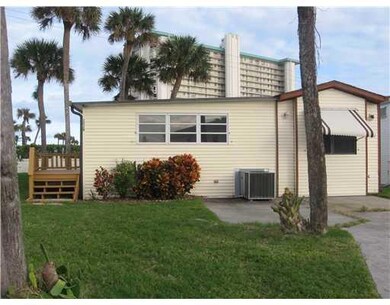 Patio/Deck. Note Oceanfront condo across the road-