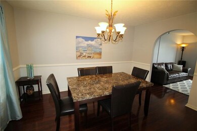 The new flooring continues into the dining room.
