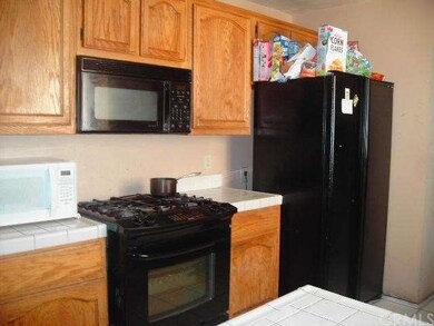 BIG KITCHEN WITH WOOD CABINETS