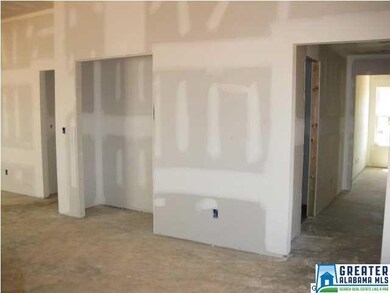 In the kitchen showing the double pantry door and 