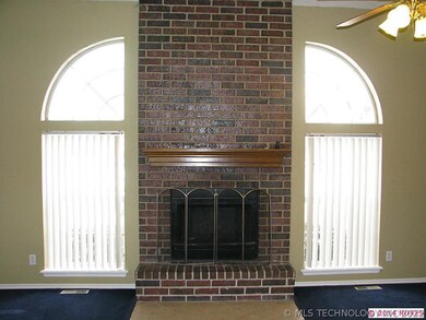 Amazing fireplace with beautiful side windows.