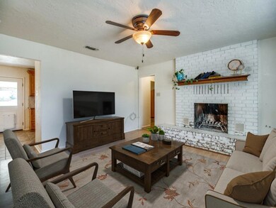 Large living area just inside the front entrance.  This image has been virtually staged