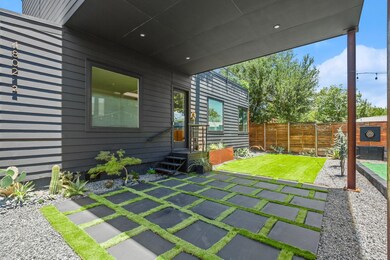 Fenced backyard with a patio