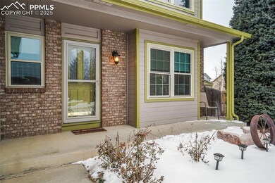 View of snow covered property entrance