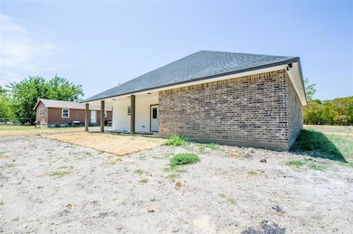 809 E Denton St, Ennis, TX 75119 - photo 6