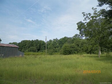 View of land behind the building on 8+- Acres.