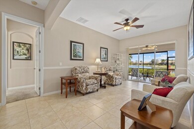 Living Room- Sliders open to Lanai Area. This could be a Formal Dining Room