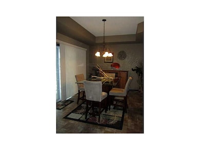 Dining Area. Dining room with slider to covered pa