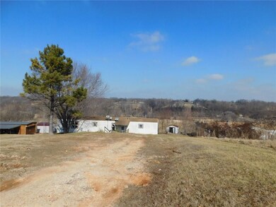 front with front yard and view in the back