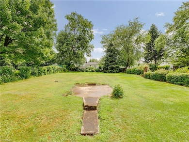 Fenced in backyard with exquisit landscaping, givi