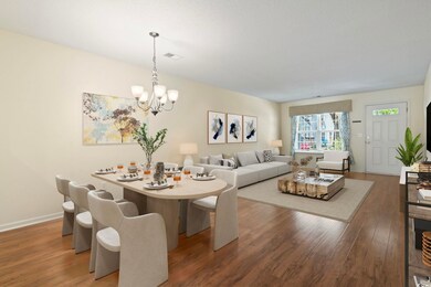 Living room with a notable chandelier and dark har