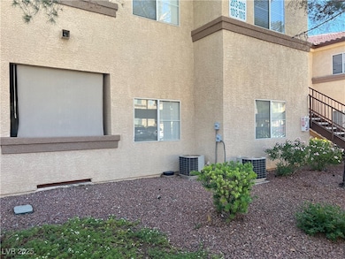 View of property exterior featuring stucco siding