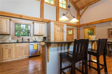 Wonderful kitchen with pantry and view out to wood