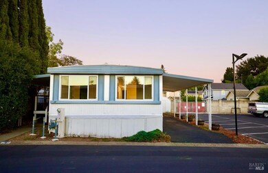 Front of home and north side front entryway with porch