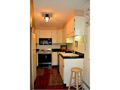 Kitchen. Galley style kitchen.  Plenty of cabinets