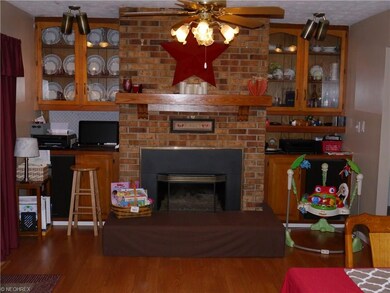Fireplace is surrounded by beautiful, space saving