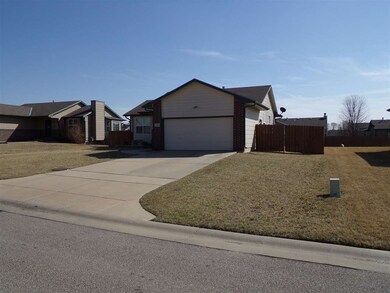 LARGE PAVED DRIVEWAY