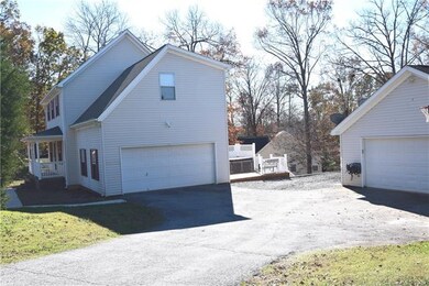 Attached 2 car garage + additional detached 2 car garage!
