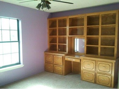 bedroom with built ins