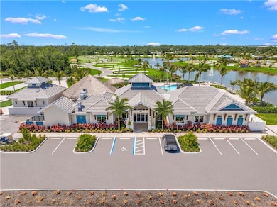 Bird's eye view with clubhouse water view