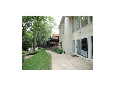 Walkout from the lower level family room, firepit 