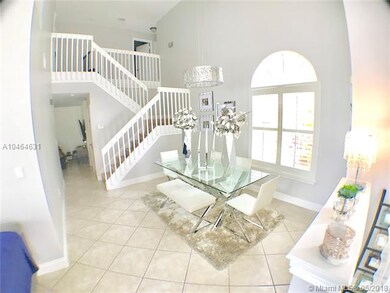 View of formal dining room and stairs