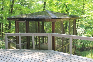 screened porch overlooks ravine