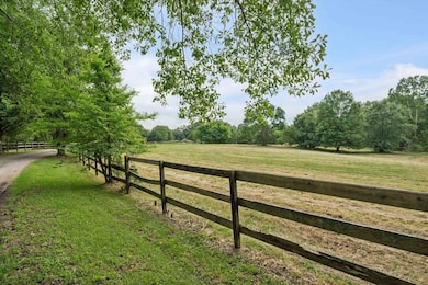 View of yard with a rural view