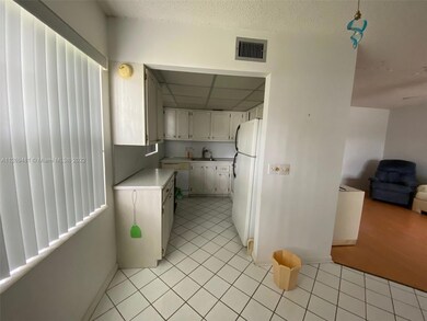View into kitchen from dining area