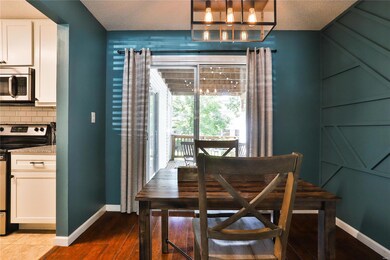 The stylish breakfast room has access the the deck