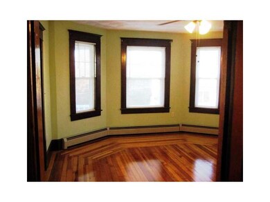 Living Room. Sunny Living Room w/Beautiful Hardwoo