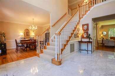 Foyer looking into dining room and family room
