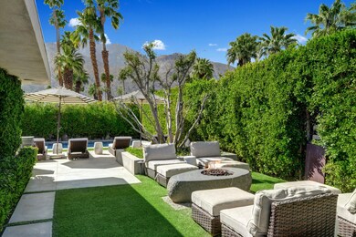 SIDE YARD WITH FIRE PIT TO MOUNTAINS- re