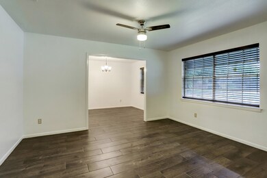 Formal living off the front entry that could be used as a game room or office.