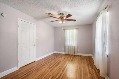 Master Bedroom with Laminate Flooring.