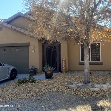 Front View with Season Changing Tree