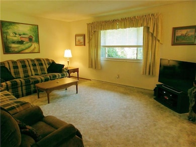 The Living Room has a Large Window that fills the 